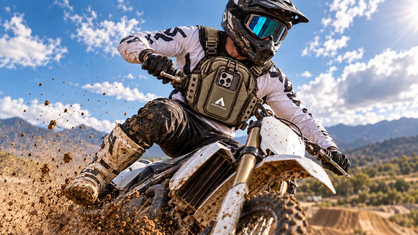 Motocross rider kicking up dirt, Vantage 3 on his chest